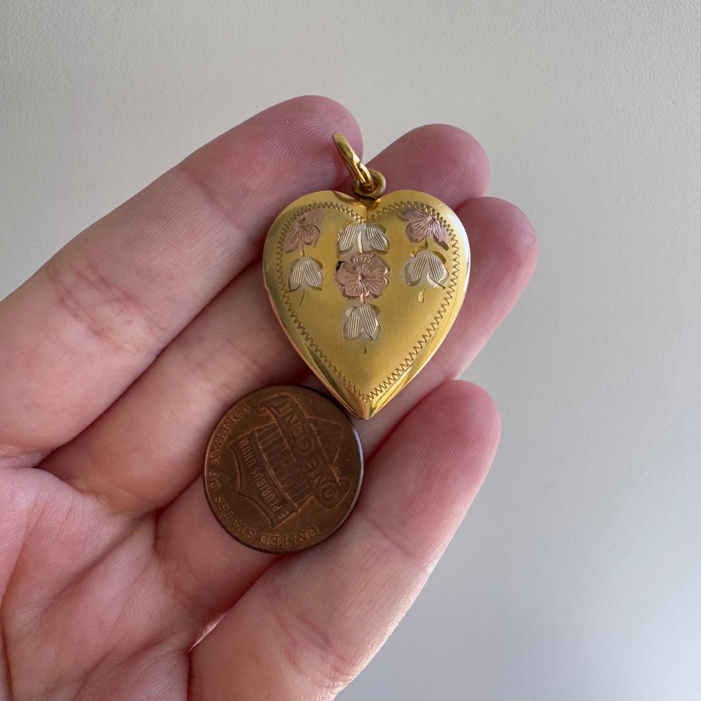 V I N T A G E // retro flower cascade / 1940s gold over sterling silver heart locket / a pendant