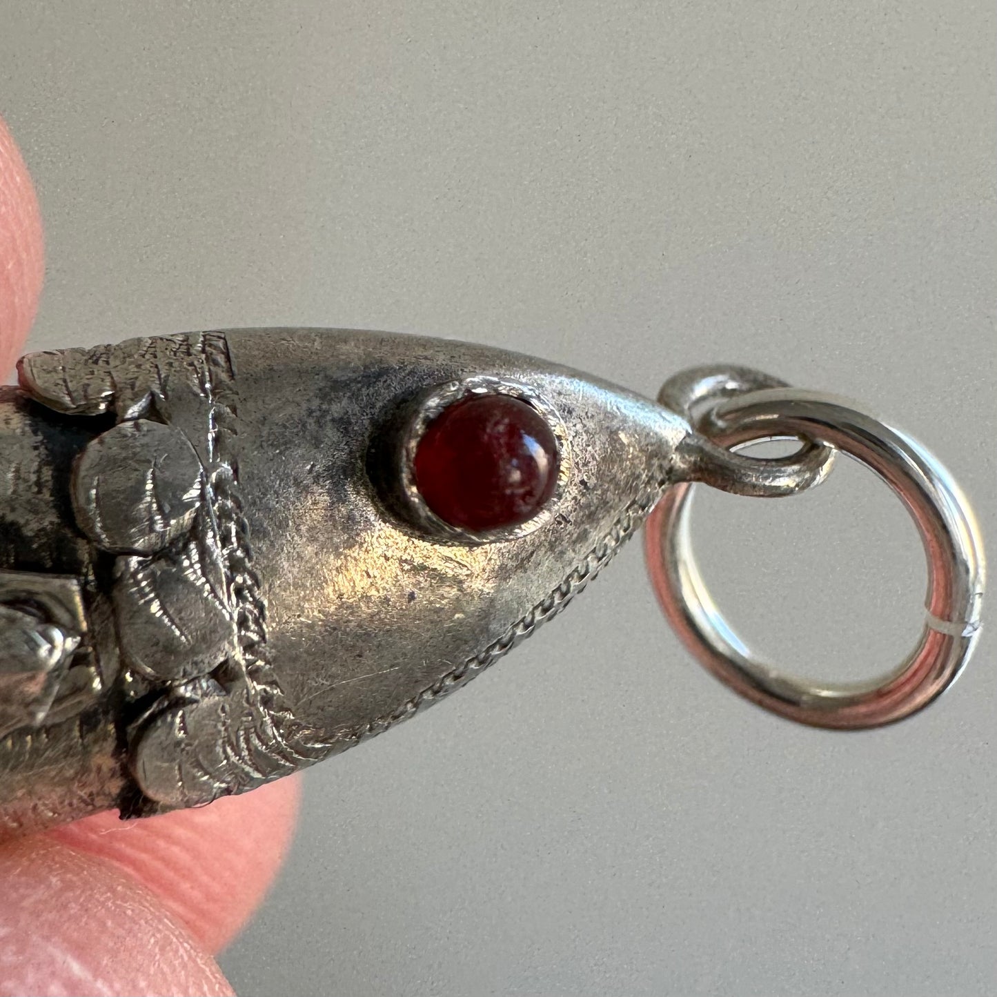 V I N T A G E // lucky catch / silver articulated wiggle fish with burgundy eyes / a pendant