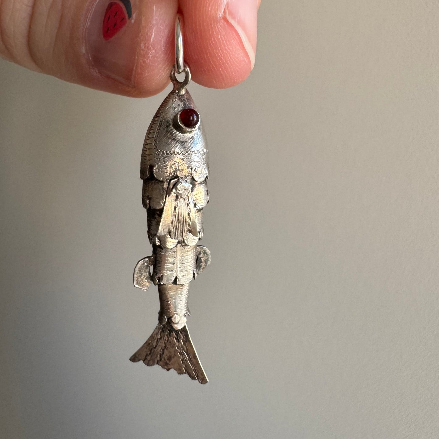 V I N T A G E // lucky catch / silver articulated wiggle fish with burgundy eyes / a pendant