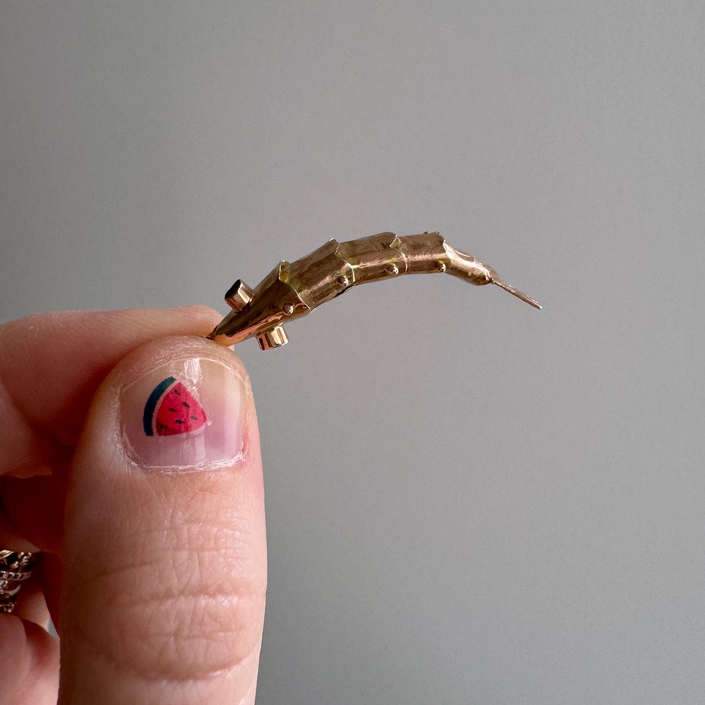 V I N T A G E // wiggly catch / 14k rosy yellow gold and red glass articulated wiggle fish / a pendant