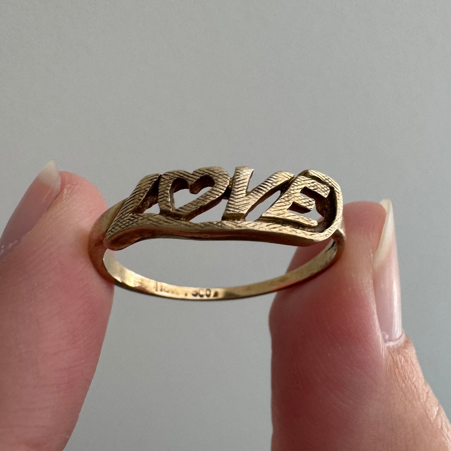 V I N T A G E // textured LOVE / 10k yellow gold LOVE word ring / size 8
