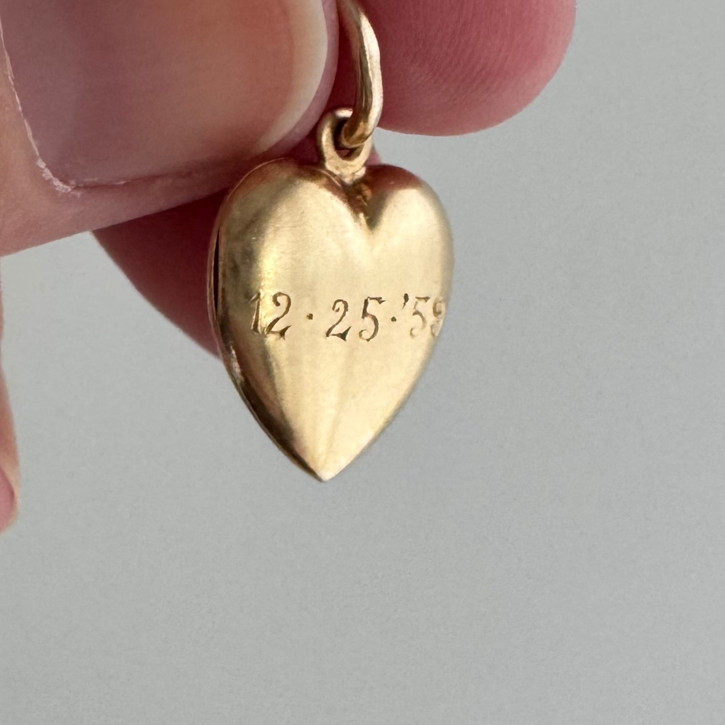 V I N T A G E // a special date / 14k gold puffy heart shaped locket engraved with "12-25-59" / a pendant