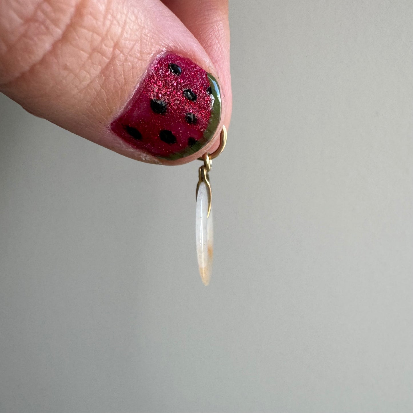 A N T I Q U E // the nature of energy / 14k white and orange jade donut / a dainty pendant