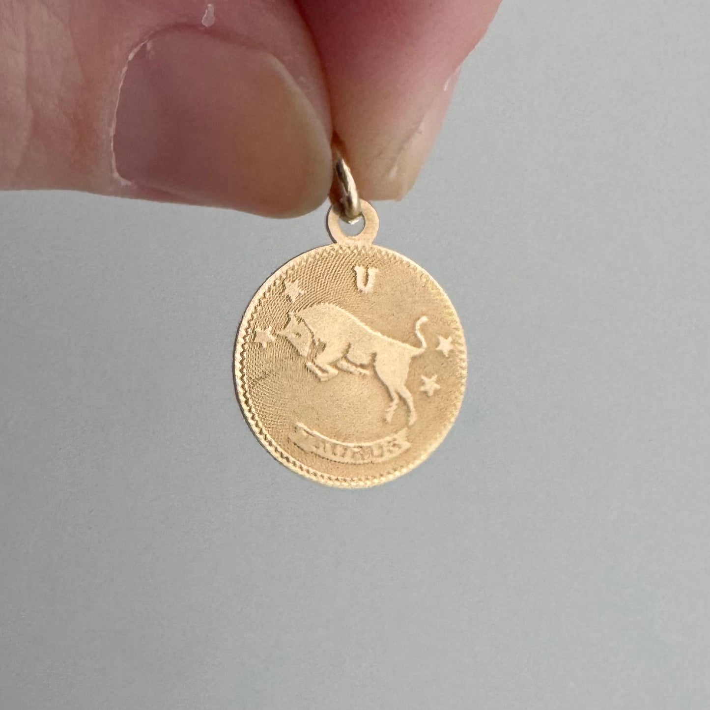 V I N T A G E // dainty bull / 14k yellow gold Taurus zodiac bull by Crea / a charm or pendant