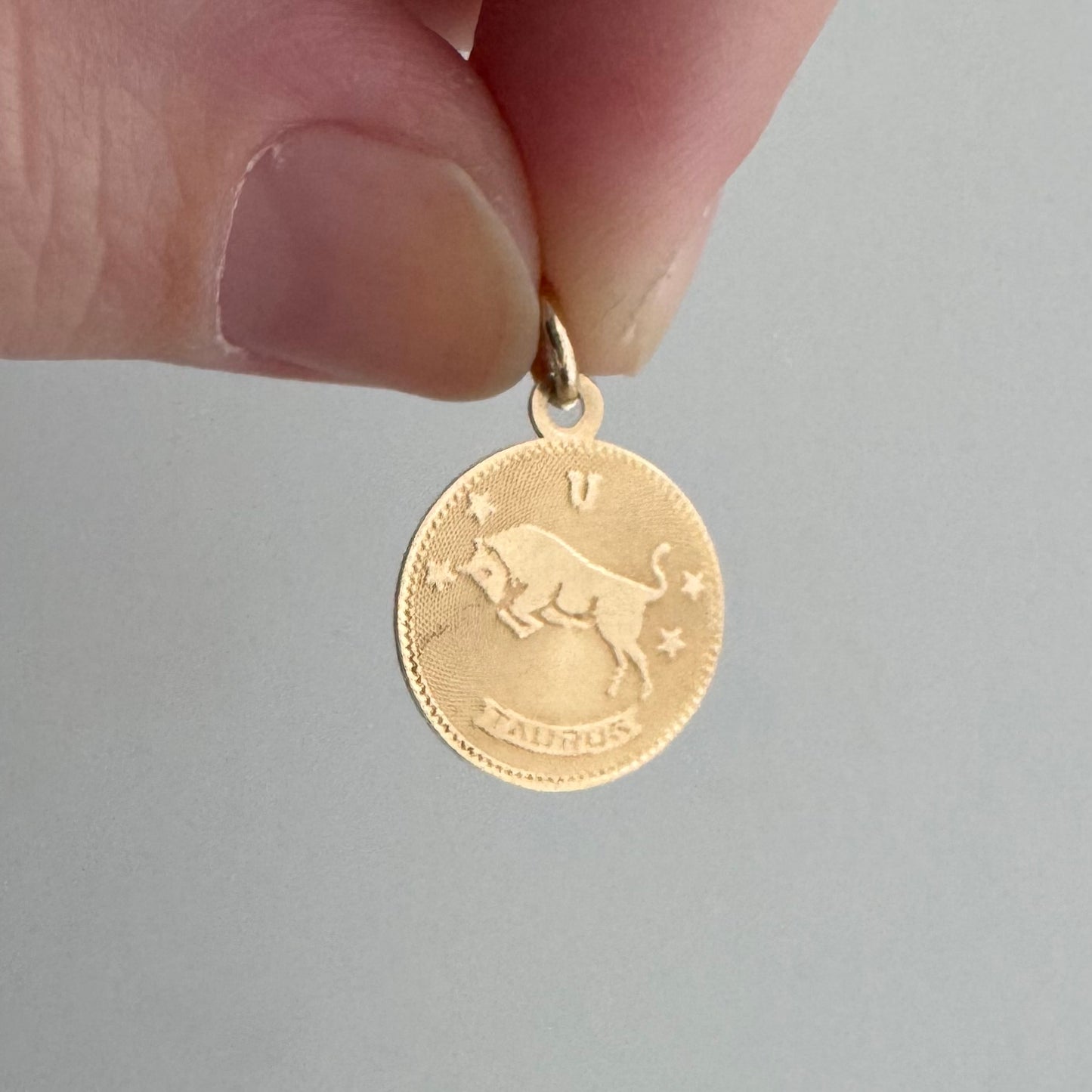 V I N T A G E // dainty bull / 14k yellow gold Taurus zodiac bull by Crea / a charm or pendant