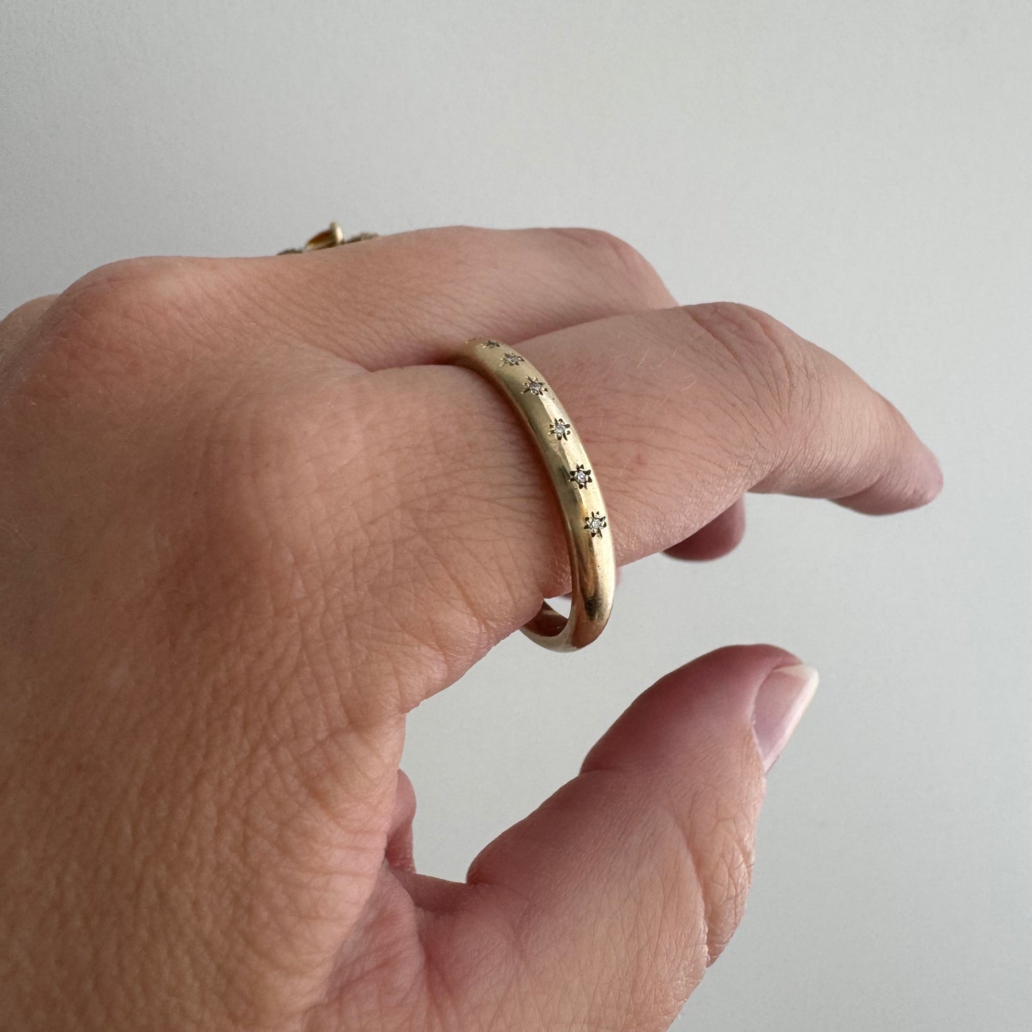 reimagined V I N T A G E // star story / 14k skinny donut band with seven new star-set diamonds / size 12