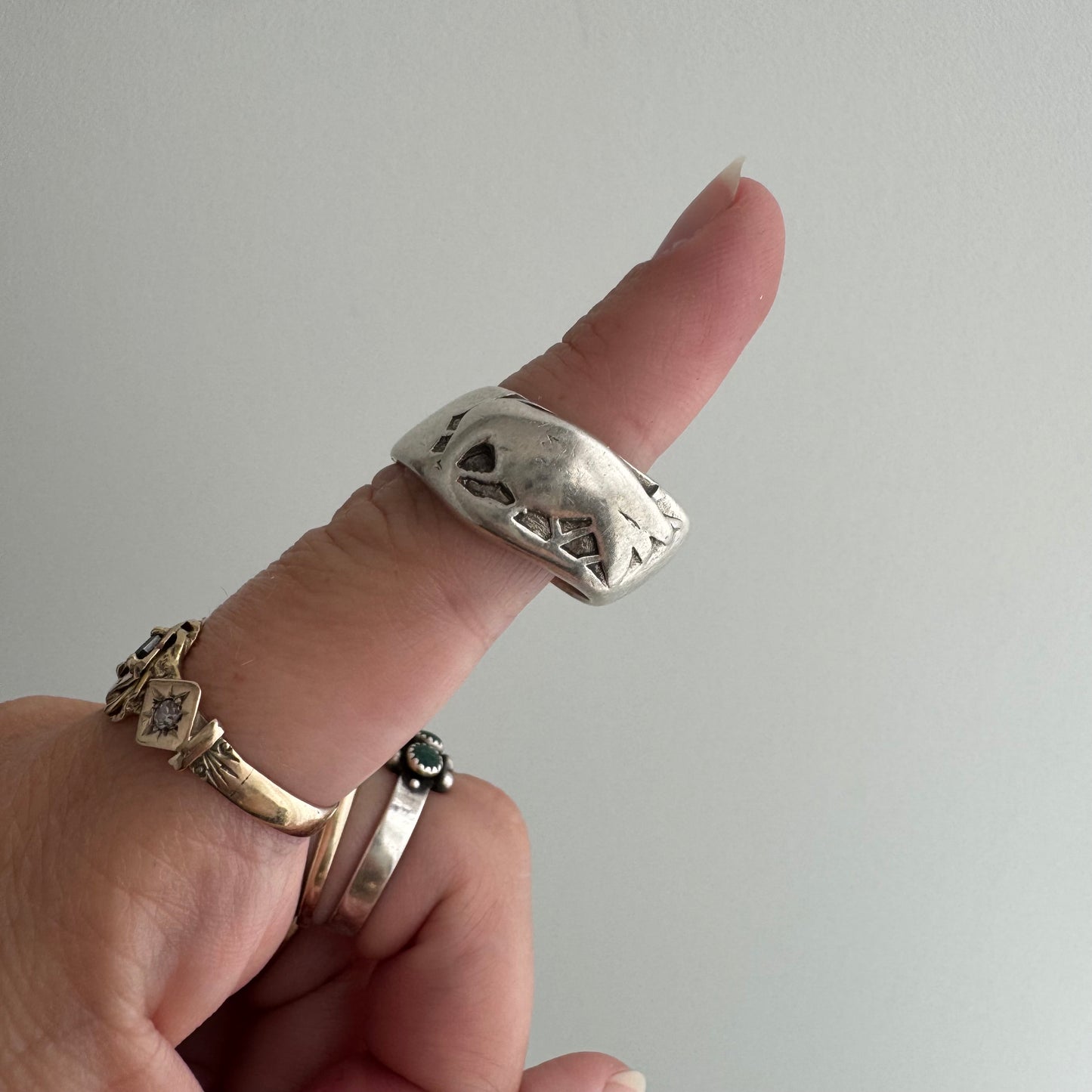 V I N T A G E // feathered friend / sterling silver worn raven wide tapered band / size 7ish