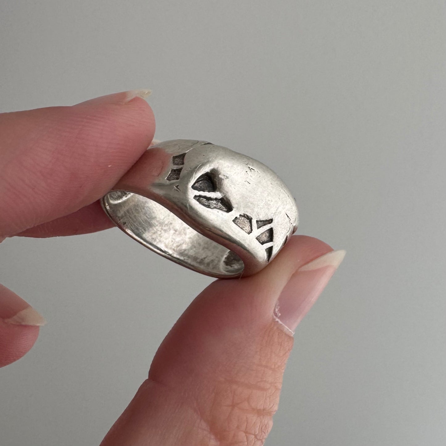 V I N T A G E // feathered friend / sterling silver worn raven wide tapered band / size 7ish