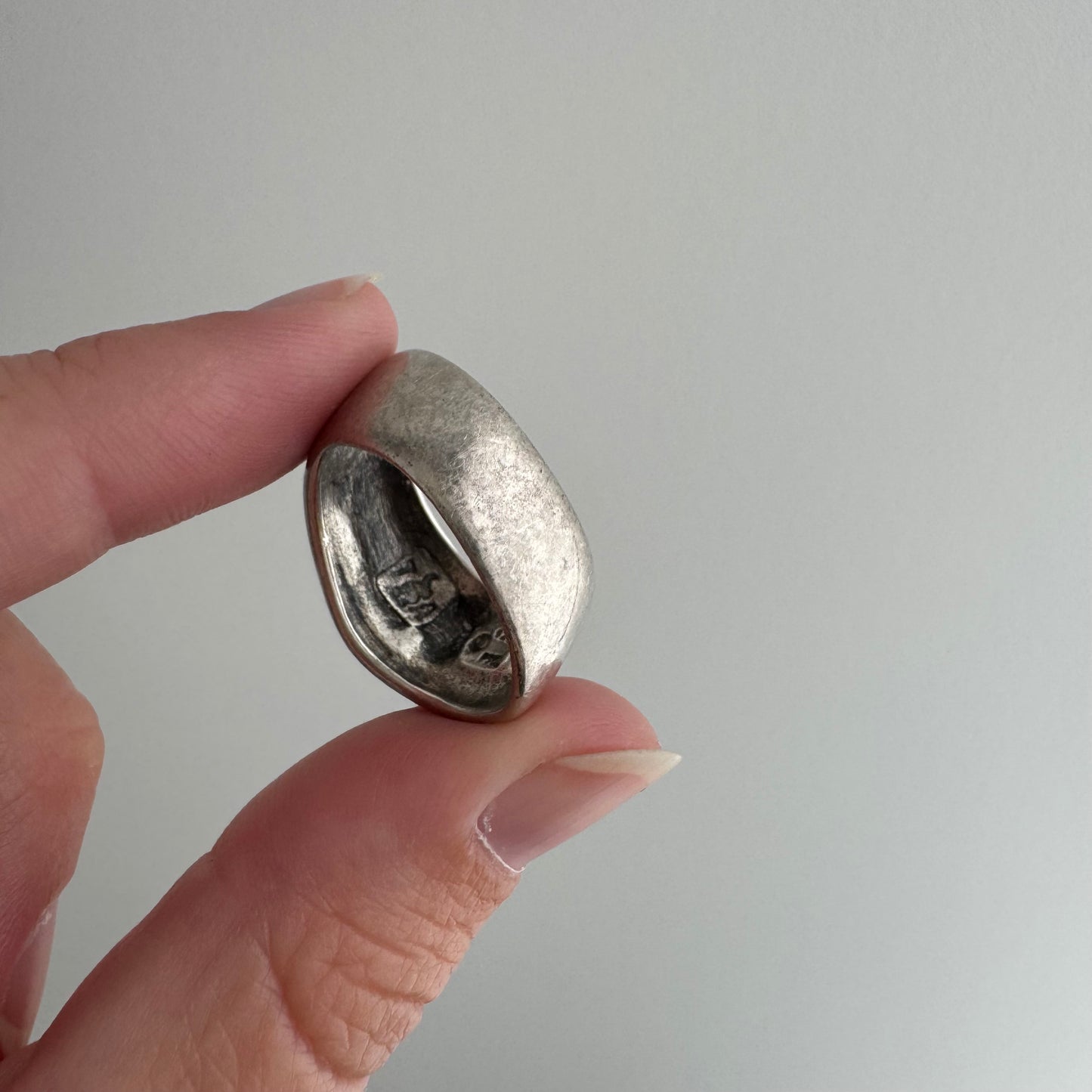 V I N T A G E // feathered friend / sterling silver worn raven wide tapered band / size 7ish