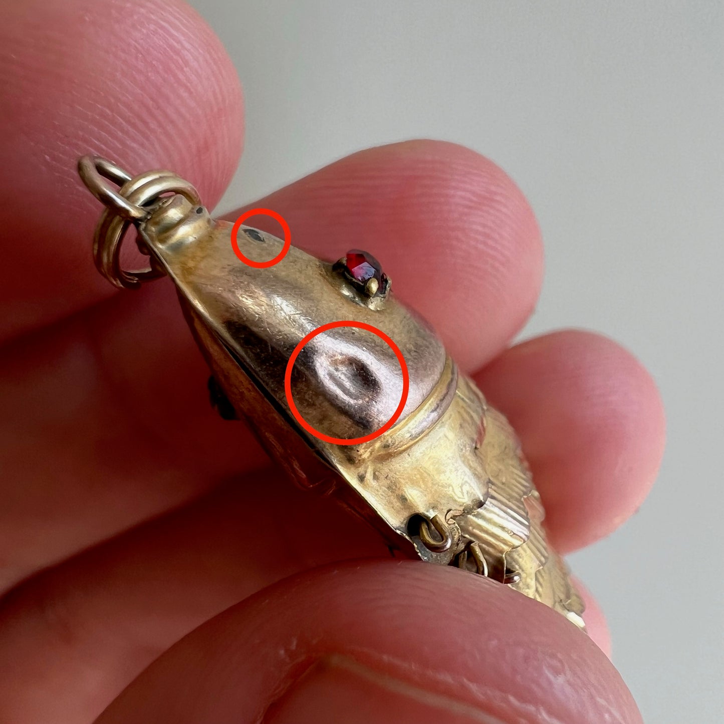 A N T I Q U E // resilient articulation / 14k rosy yellow gold and red glass articulated wiggle fish / a pendant