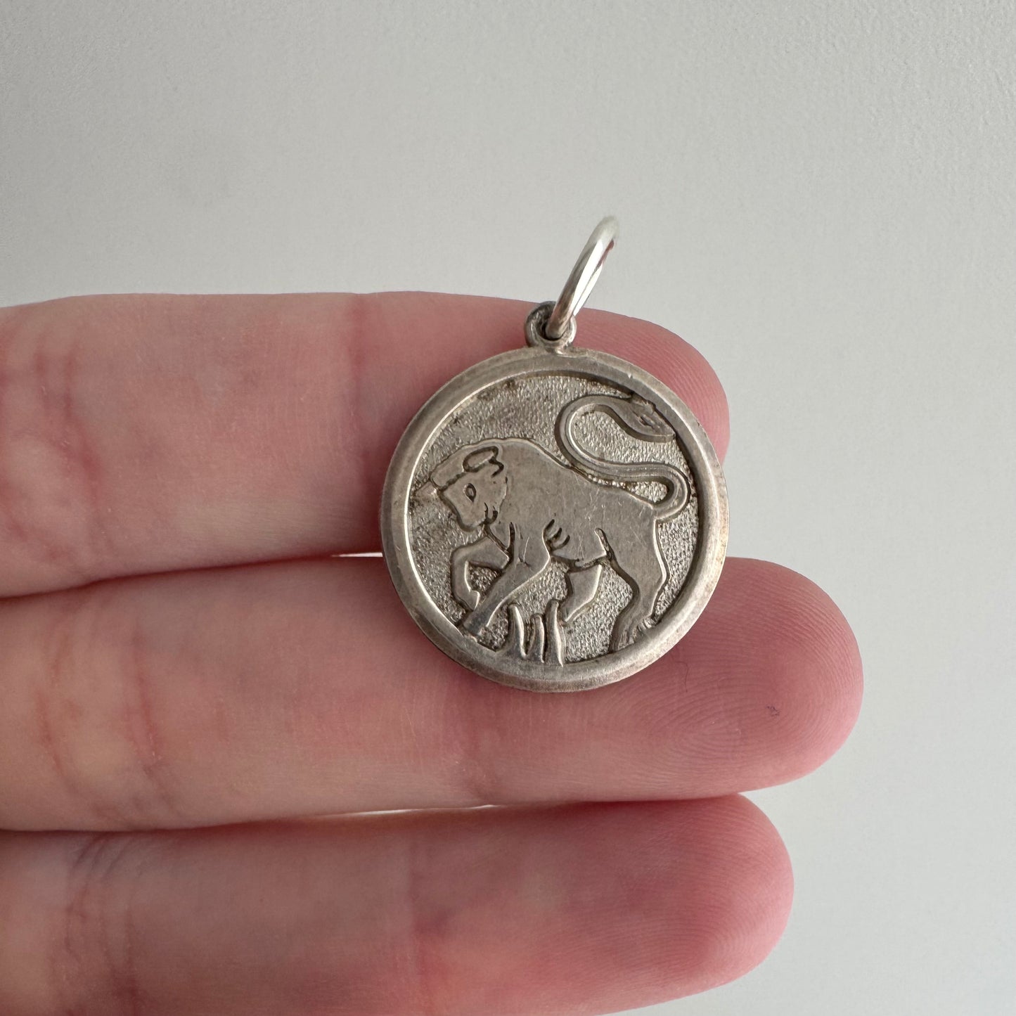 V I N T A G E // bullish / sterling silver framed bull in relief / a pendant