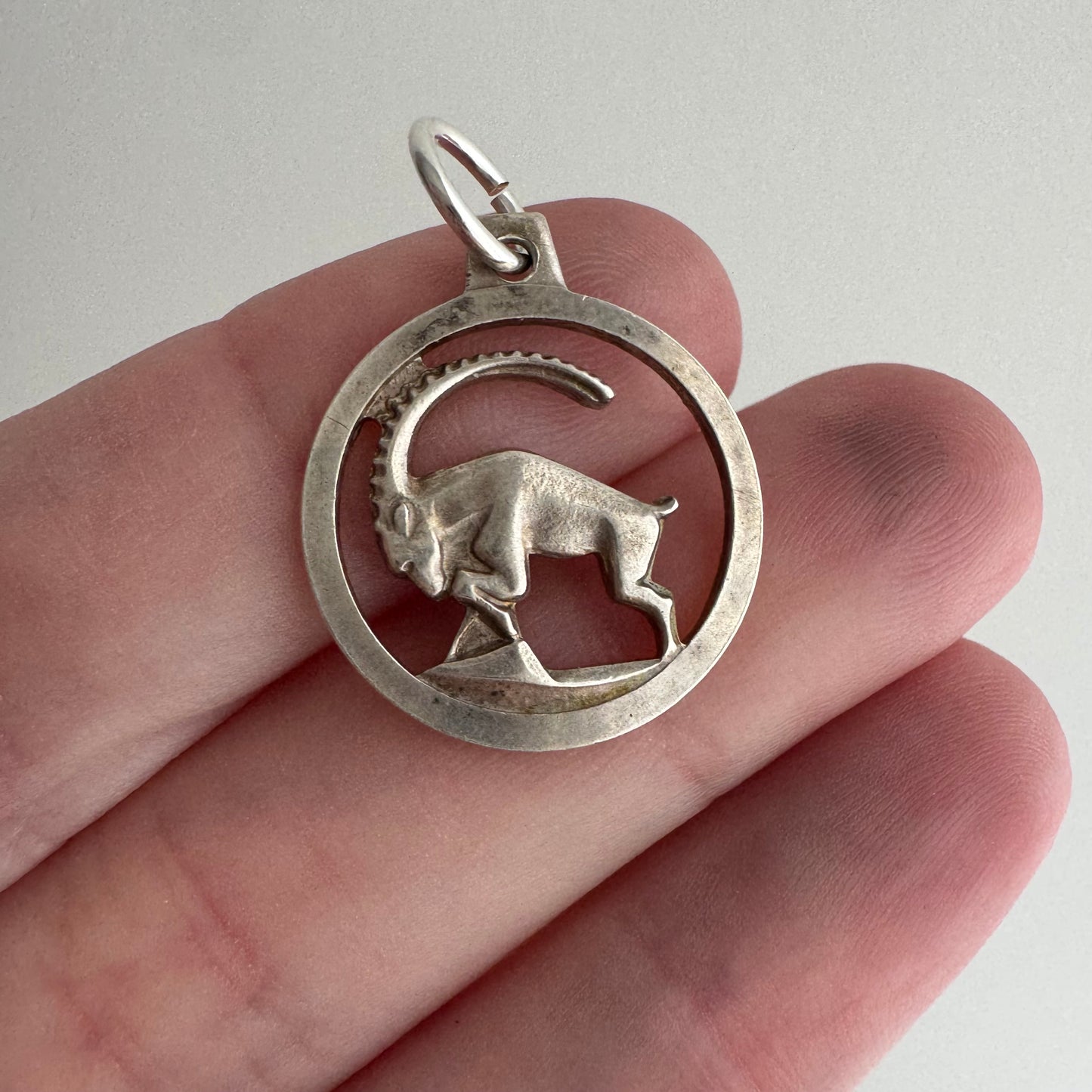 V I N T A G E // Capricorn readiness / sterling silver long horn goat ready to ram / a pendant