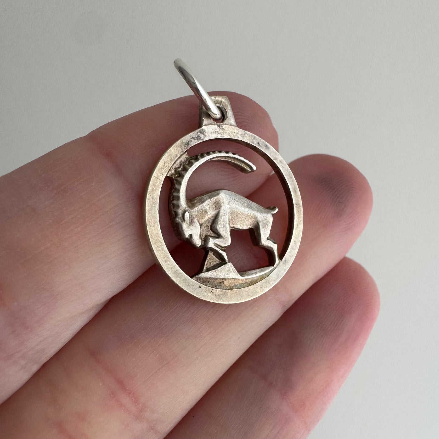 V I N T A G E // Capricorn readiness / sterling silver long horn goat ready to ram / a pendant