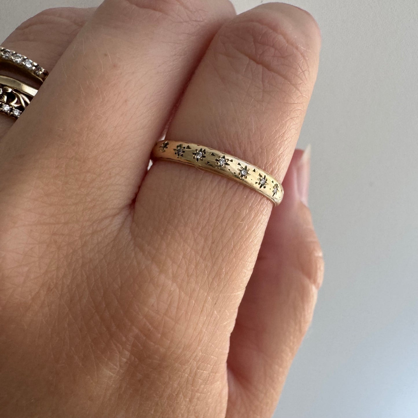 reimagined V I N T A G E // star story / 14k faded patterned band with seven new star-set diamonds / size 8.5