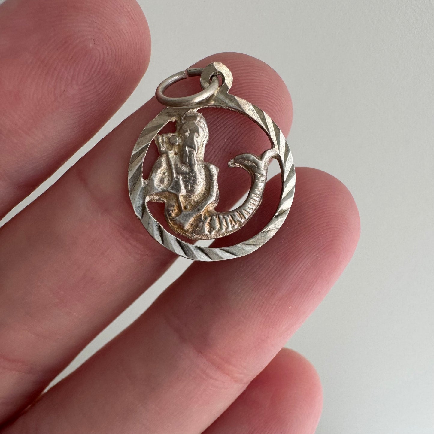 V I N T A G E // sea-based / sterling silver engine turned merman with staff / a pendant