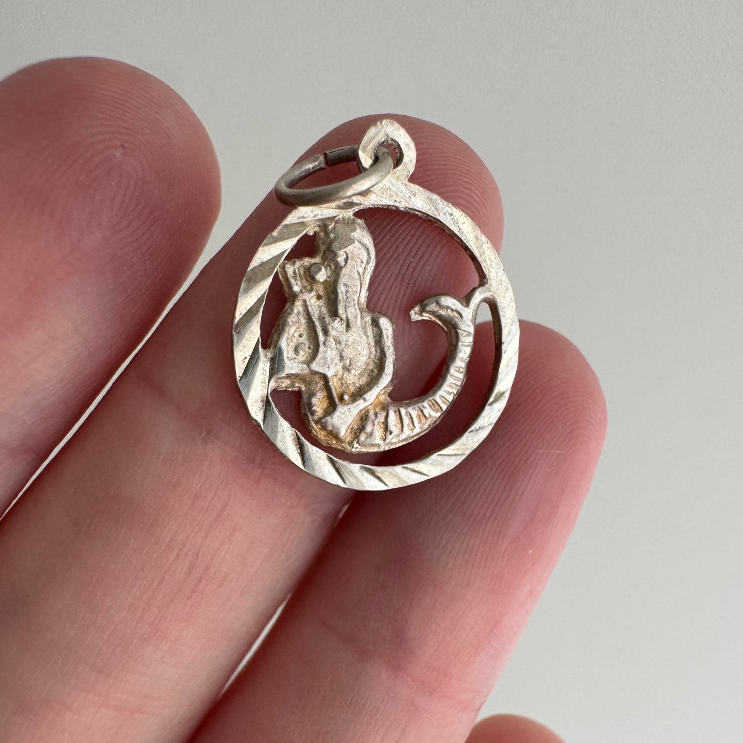 V I N T A G E // sea-based / sterling silver engine turned merman with staff / a pendant