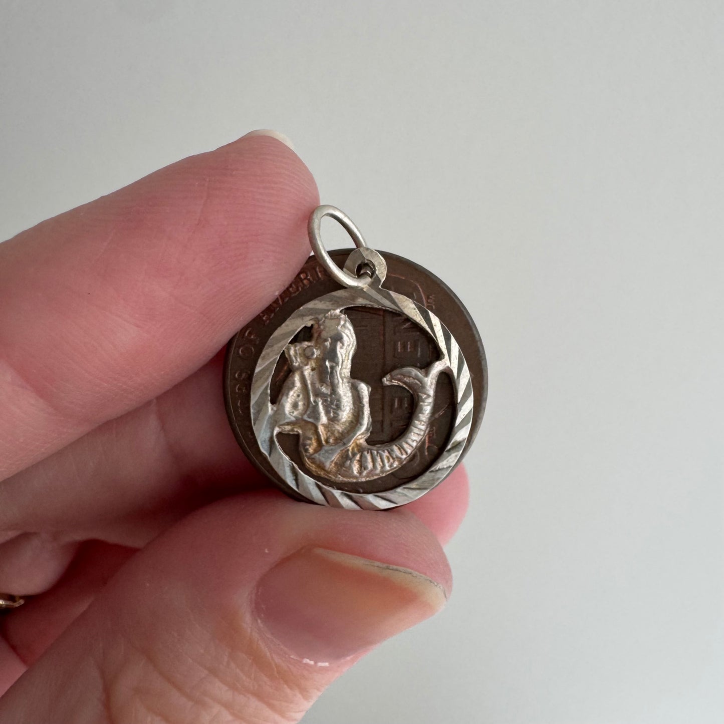 V I N T A G E // sea-based / sterling silver engine turned merman with staff / a pendant