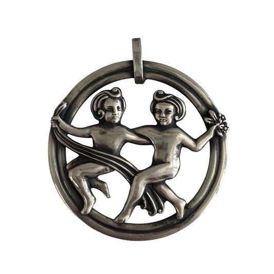 V I N T A G E // dynamic duo / sterling silver twin figures with different gifts / a Van Dell pendant