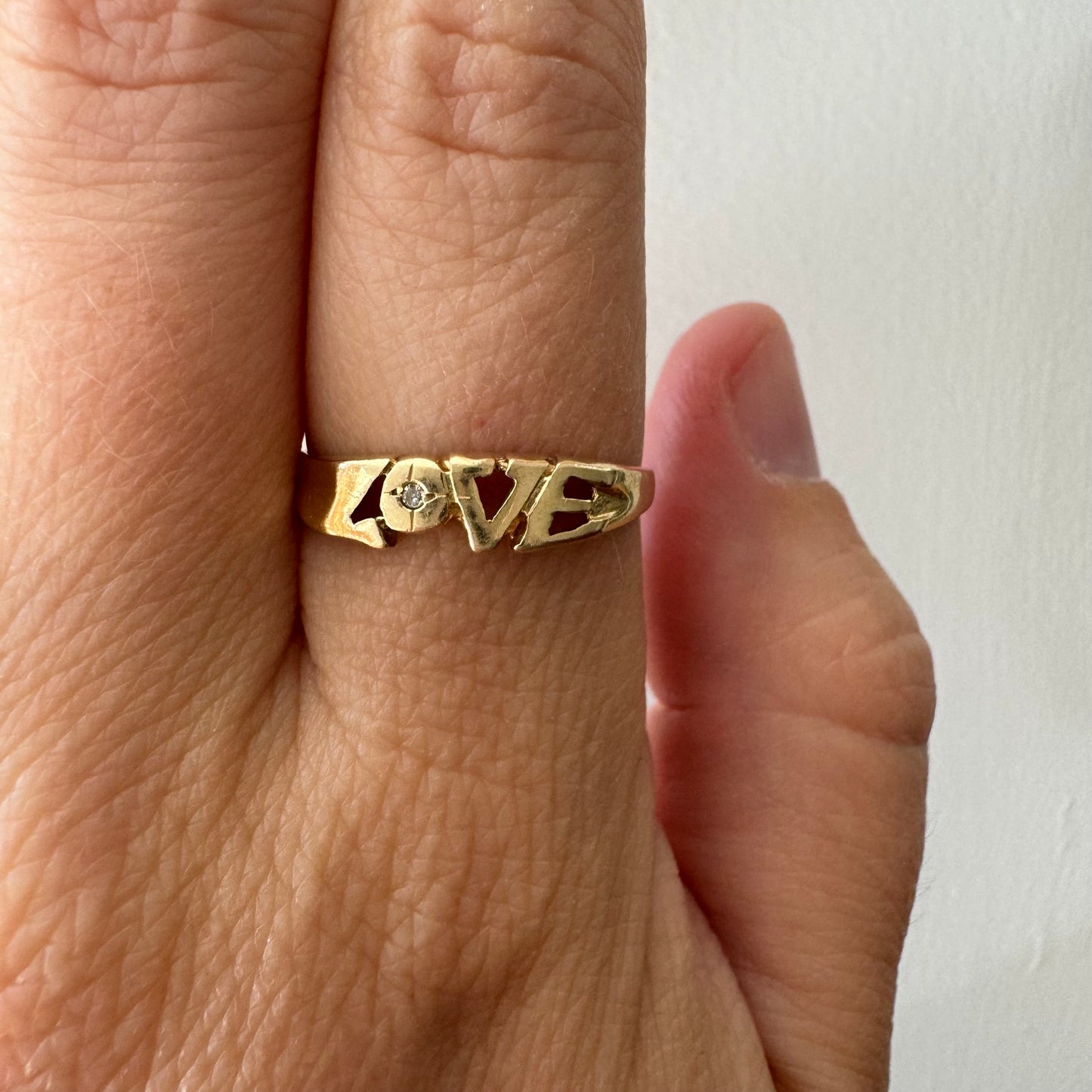 V I N T A G E // LOVE / 14k and diamond LOVE stacking ring / size 7.25