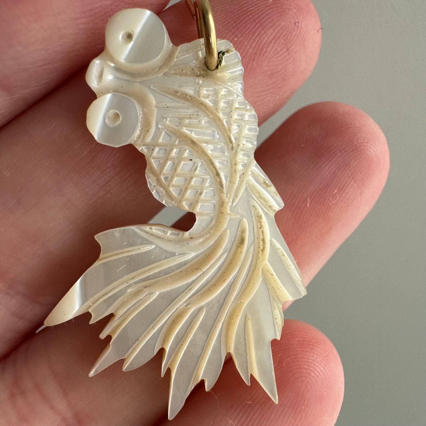 V I N T A G E // lucky fish / carved mother of pearl fish with 14k yellow gold bail / a pendant