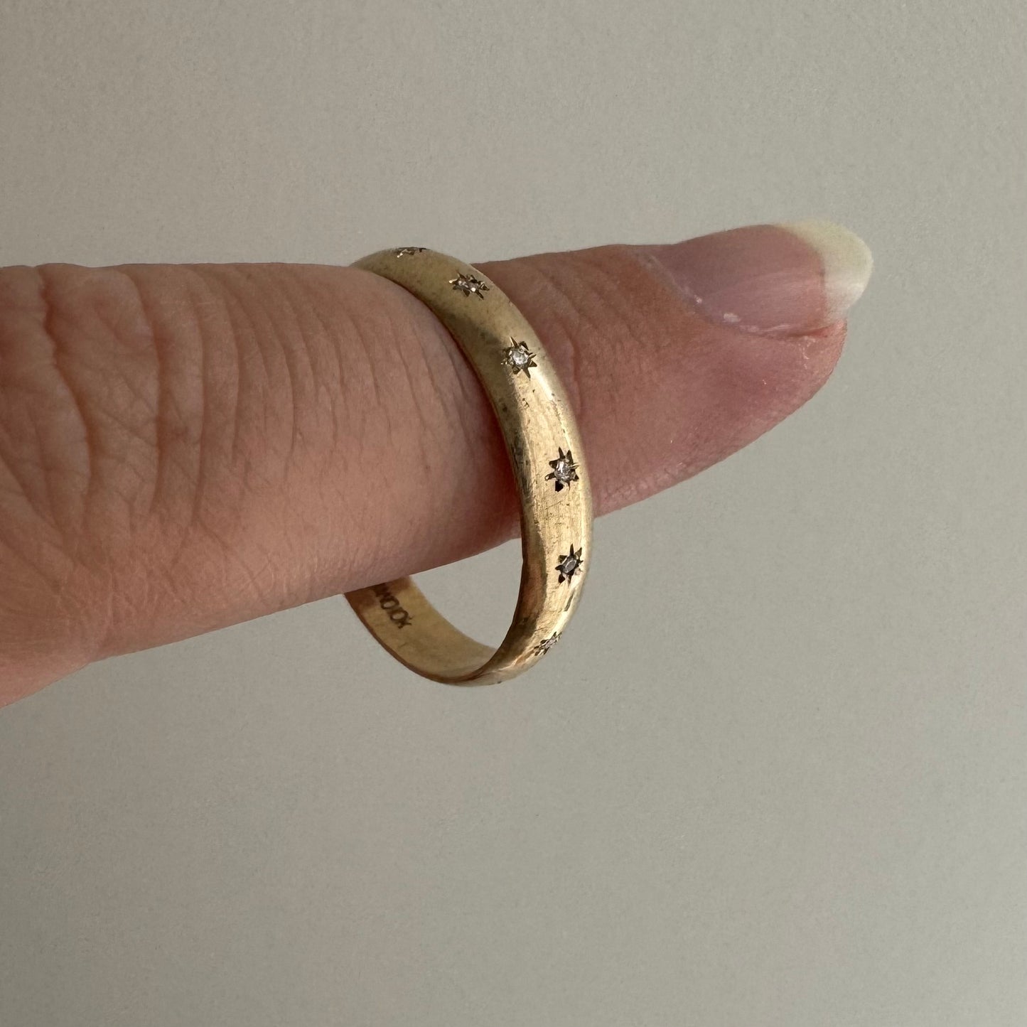 reimagined V I N T A G E // star story / 10k 4mm subtle D-shaped band with seven new star-set diamonds / size 9.5-9.75