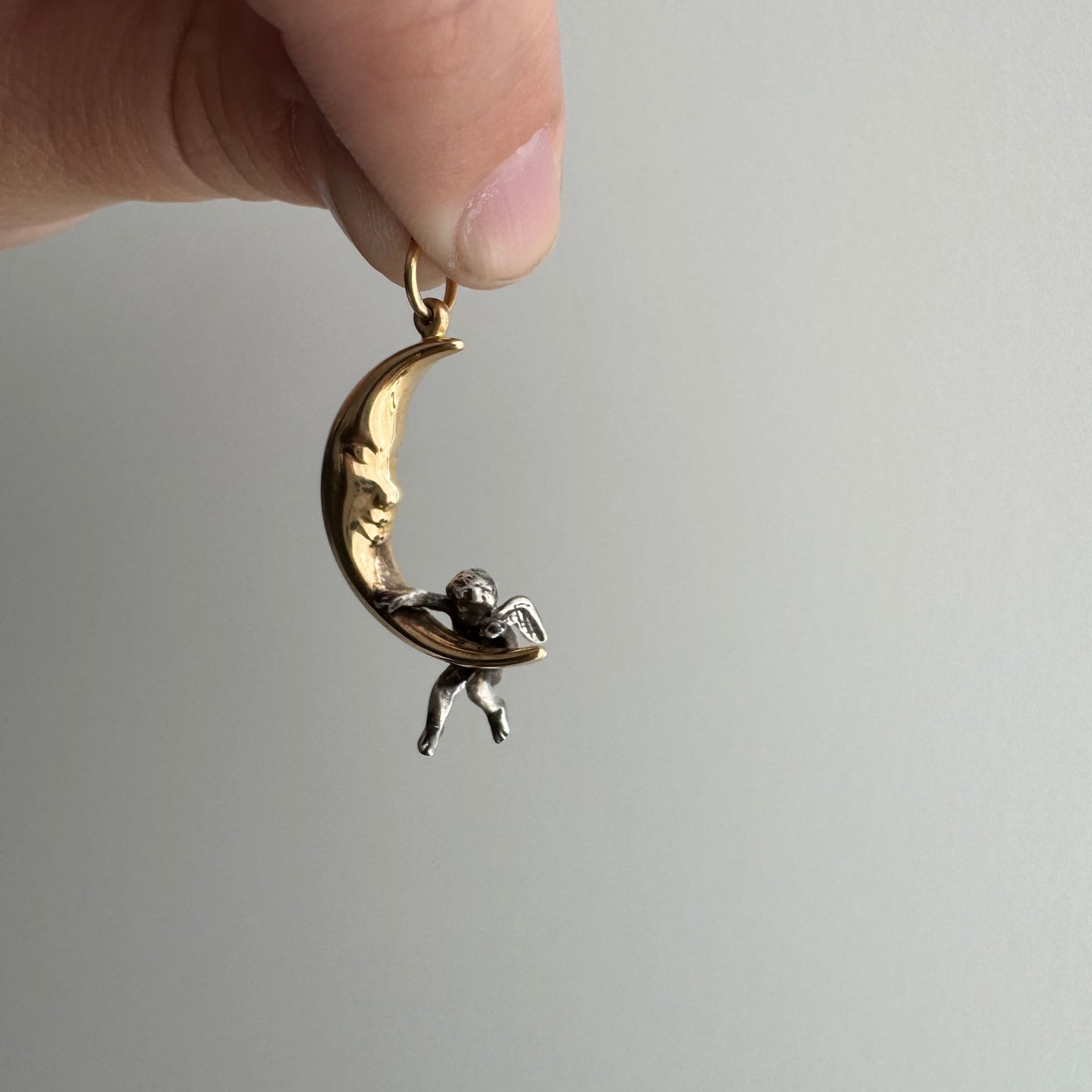V I N T A G E // celestial perspectives / 14k and sterling silver crescent moon face and angel / a pendant