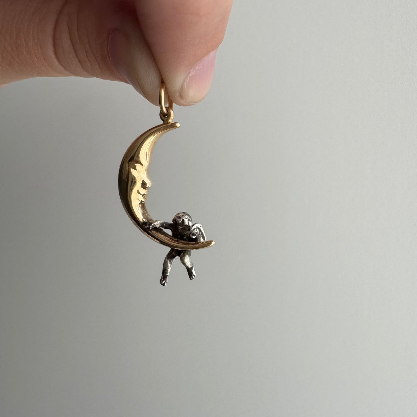 V I N T A G E // celestial perspectives / 14k and sterling silver crescent moon face and angel / a pendant