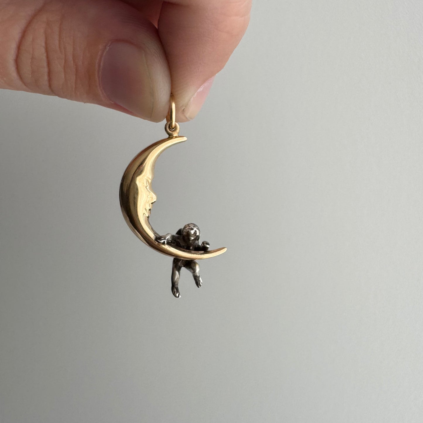 V I N T A G E // celestial perspectives / 14k and sterling silver crescent moon face and angel / a pendant