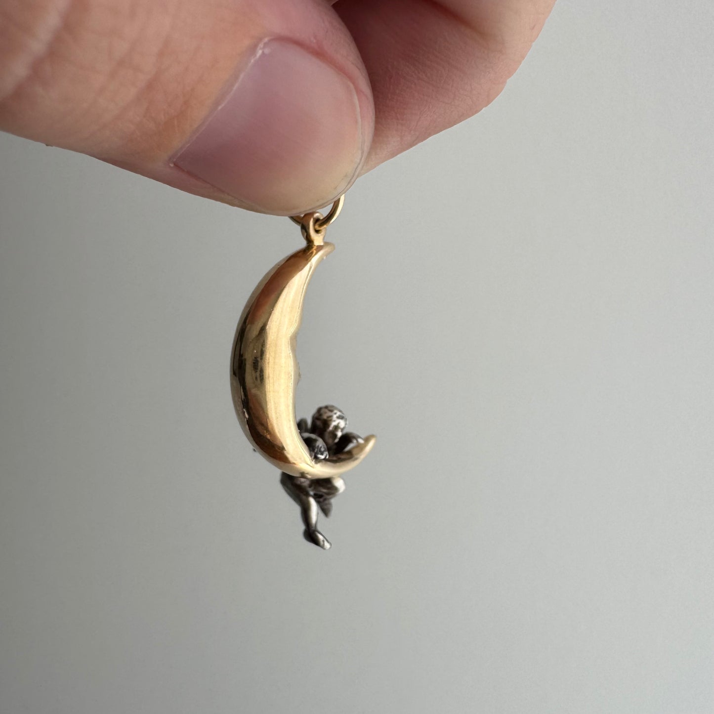 V I N T A G E // celestial perspectives / 14k and sterling silver crescent moon face and angel / a pendant