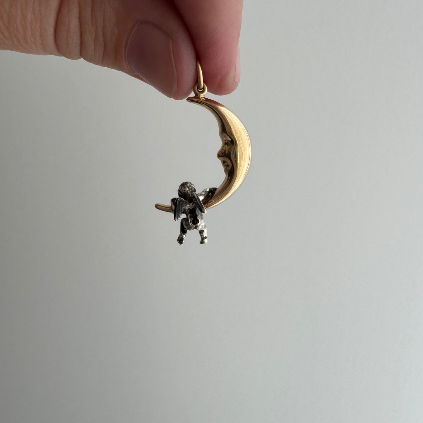 V I N T A G E // celestial perspectives / 14k and sterling silver crescent moon face and angel / a pendant