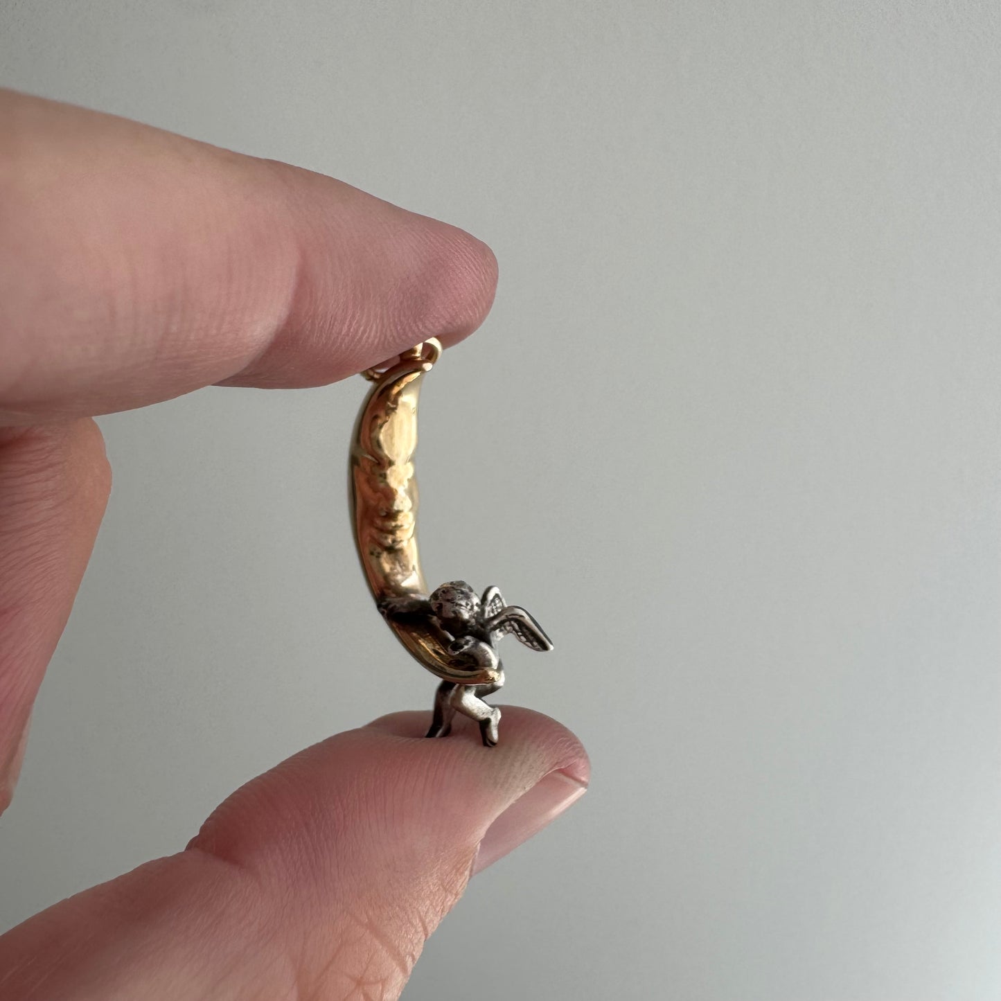 V I N T A G E // celestial perspectives / 14k and sterling silver crescent moon face and angel / a pendant