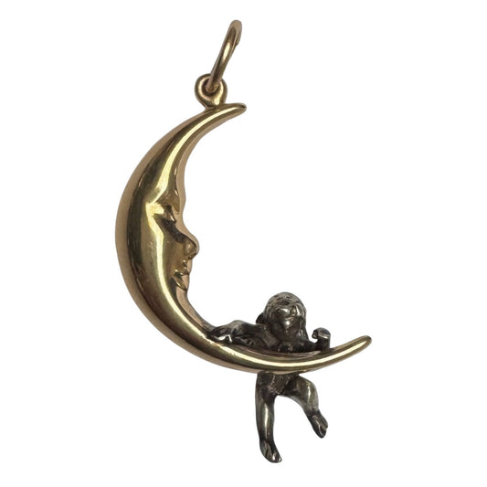 V I N T A G E // celestial perspectives / 14k and sterling silver crescent moon face and angel / a pendant