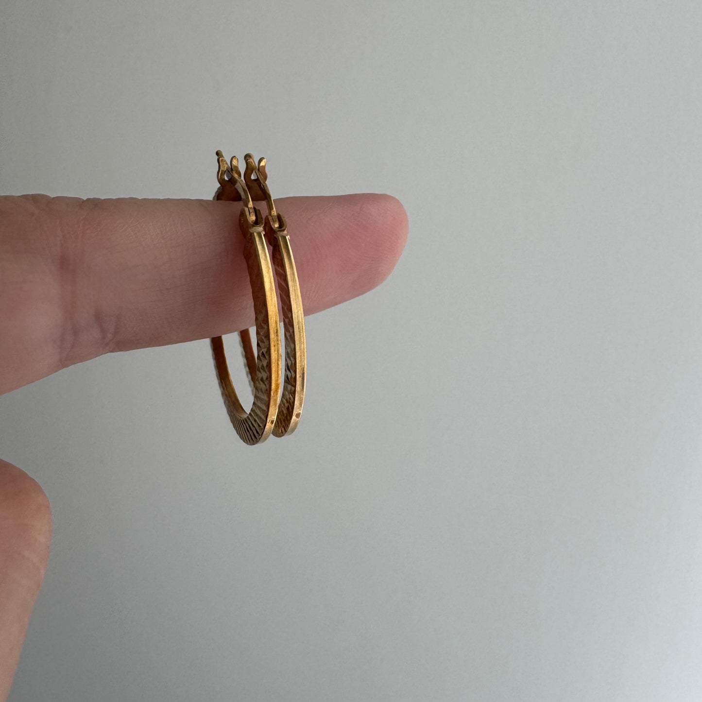 E S T A T E // snake skin circles / 10k flat wide etched round hoops / earrings