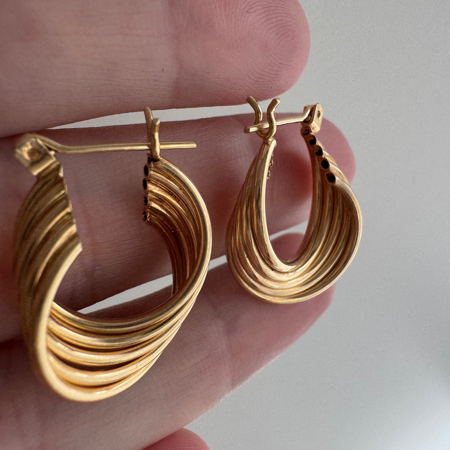 E S T A T E // twisty tubes / 14k twisted five tube huggie hoops / earrings