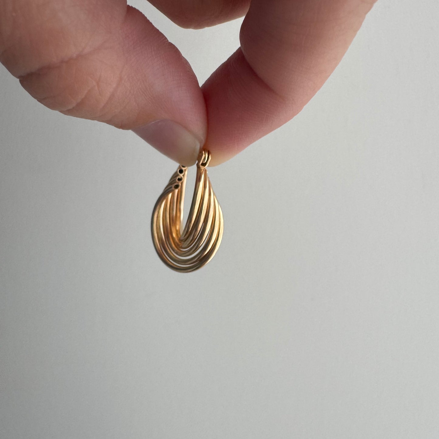 E S T A T E // twisty tubes / 14k twisted five tube huggie hoops / earrings