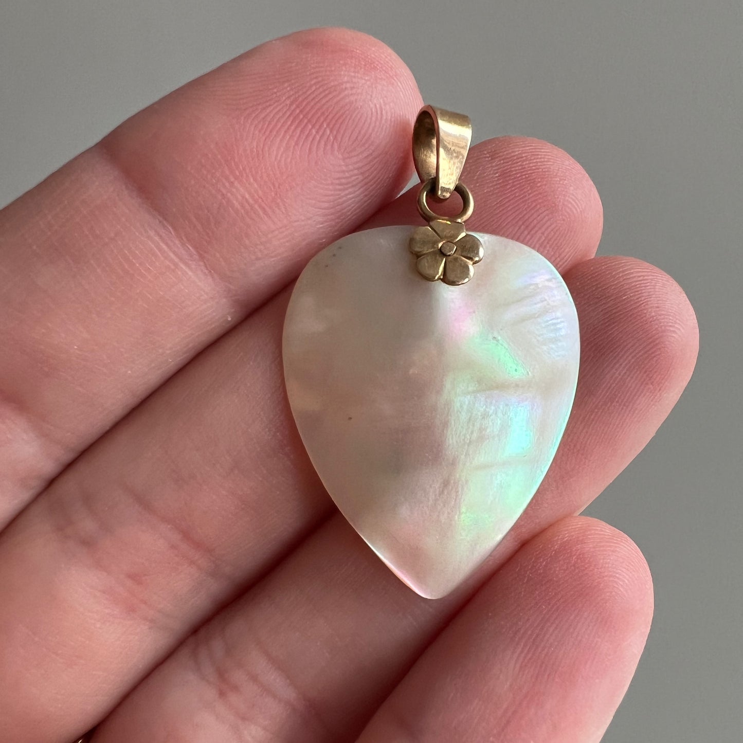 V I N T A G E // shimmery shield / 14k and mother of pearl floral heart shaped shield / a pendant