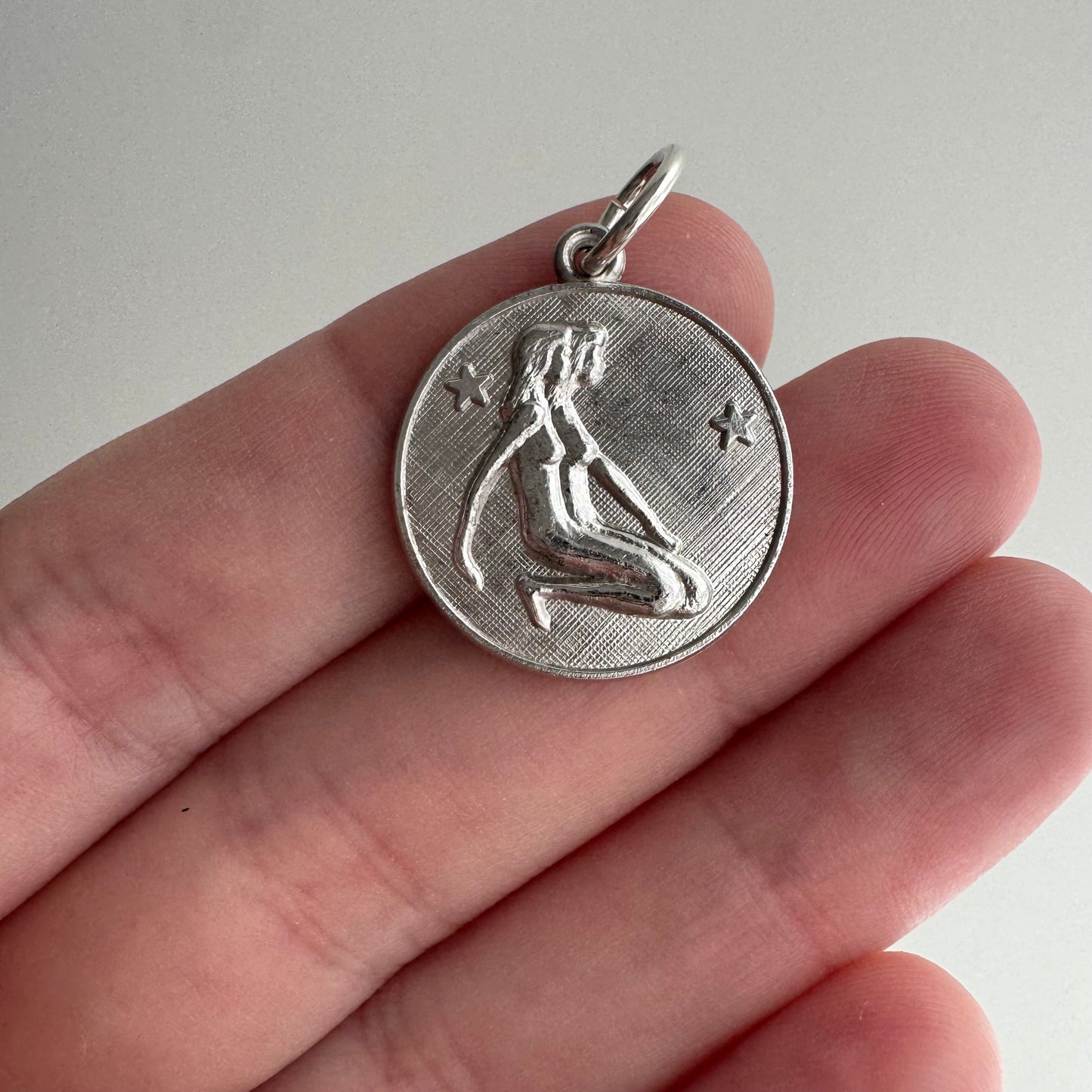 V I N T A G E // side by side / sterling silver kneeling zodiac femmes / a pendant