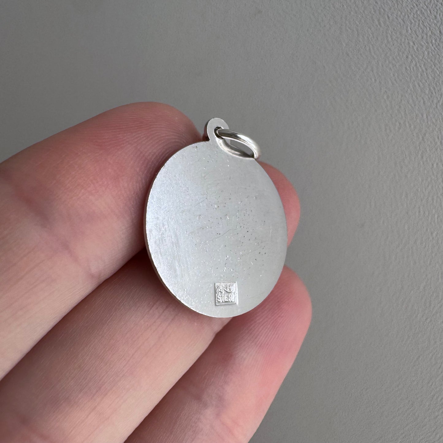 V I N T A G E // side by side / sterling silver kneeling zodiac femmes / a pendant