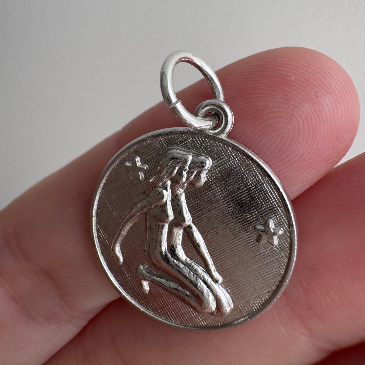 V I N T A G E // side by side / sterling silver kneeling zodiac femmes / a pendant