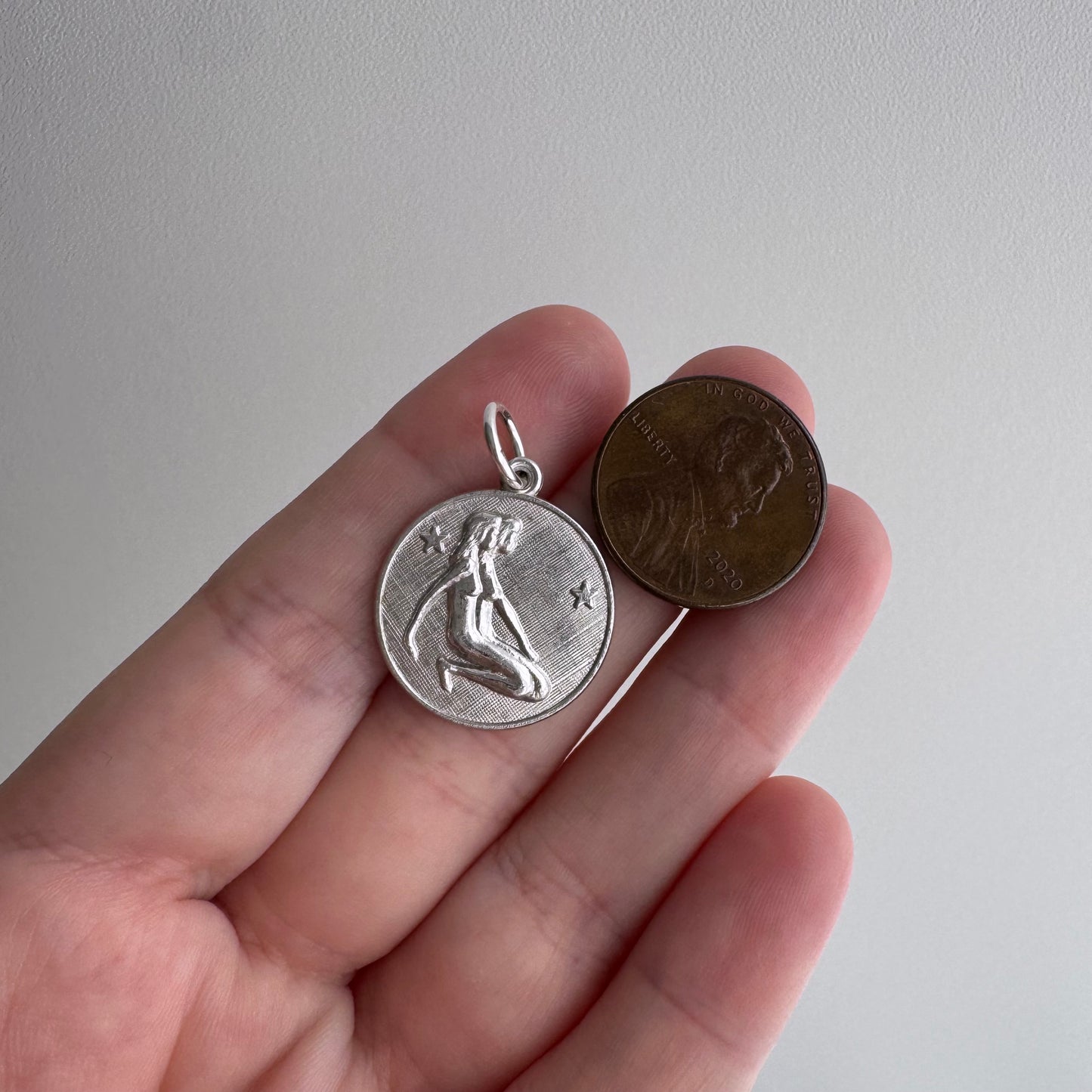 V I N T A G E // side by side / sterling silver kneeling zodiac femmes / a pendant