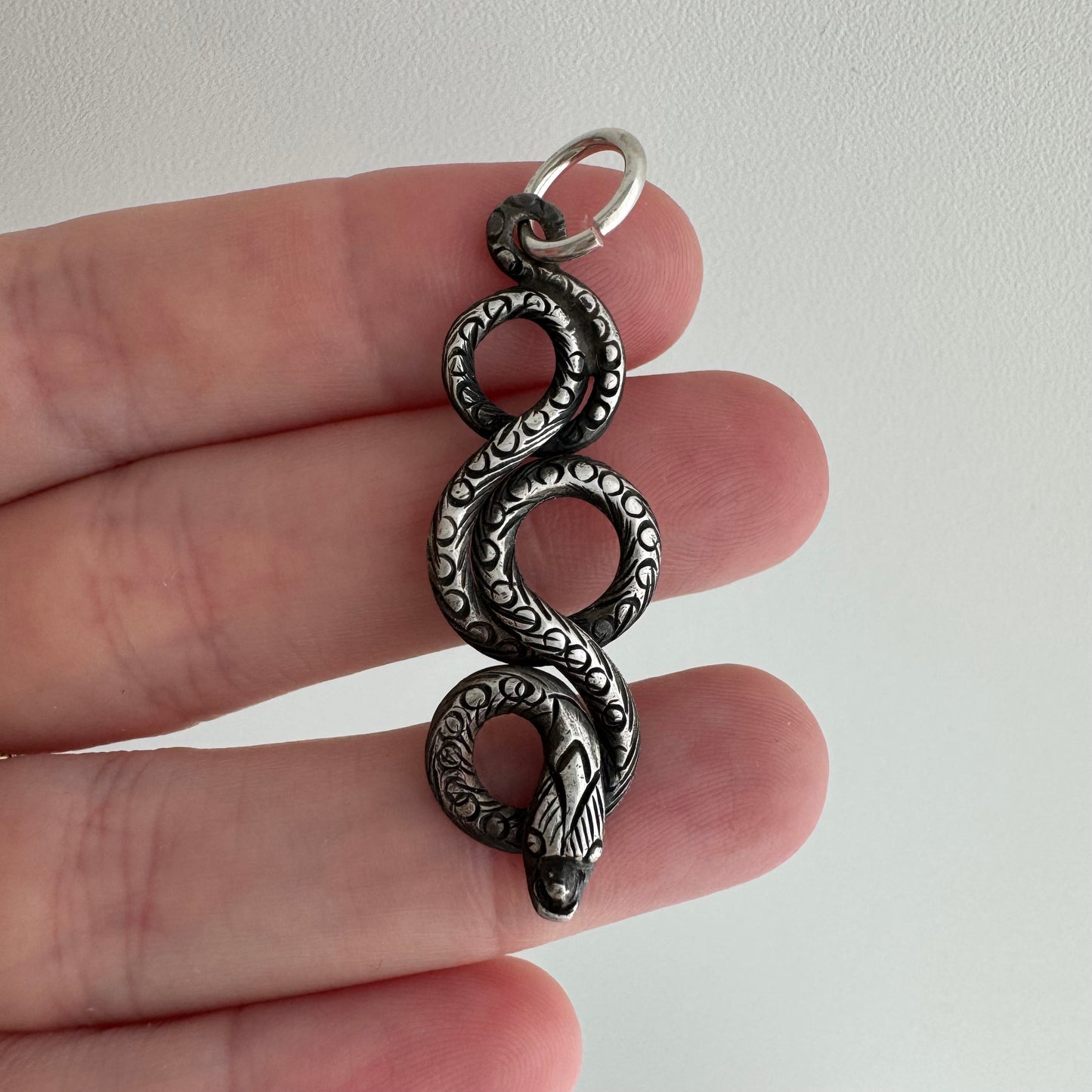 V I N T A G E // looping snake / sterling silver stamped and engraved snake / a pendant