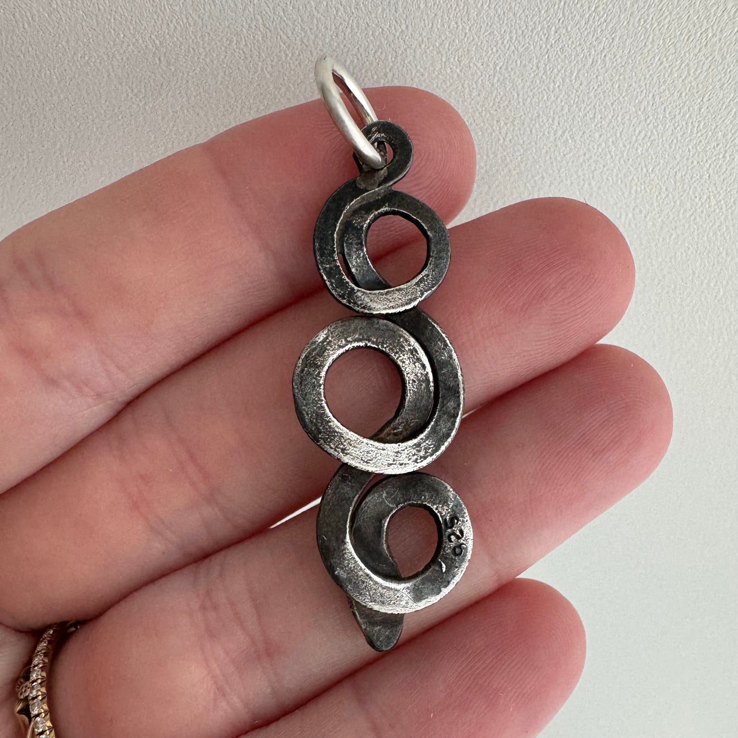 V I N T A G E // looping snake / sterling silver stamped and engraved snake / a pendant