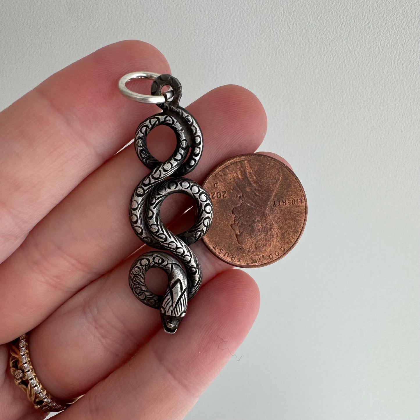 V I N T A G E // looping snake / sterling silver stamped and engraved snake / a pendant