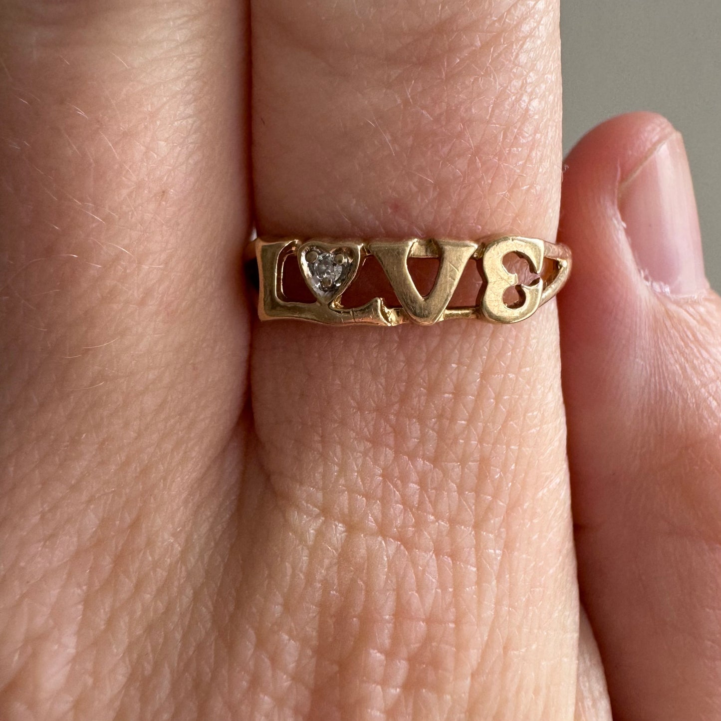 V I N T A G E // LOVE / 10k and diamond love word ring / size 6.75