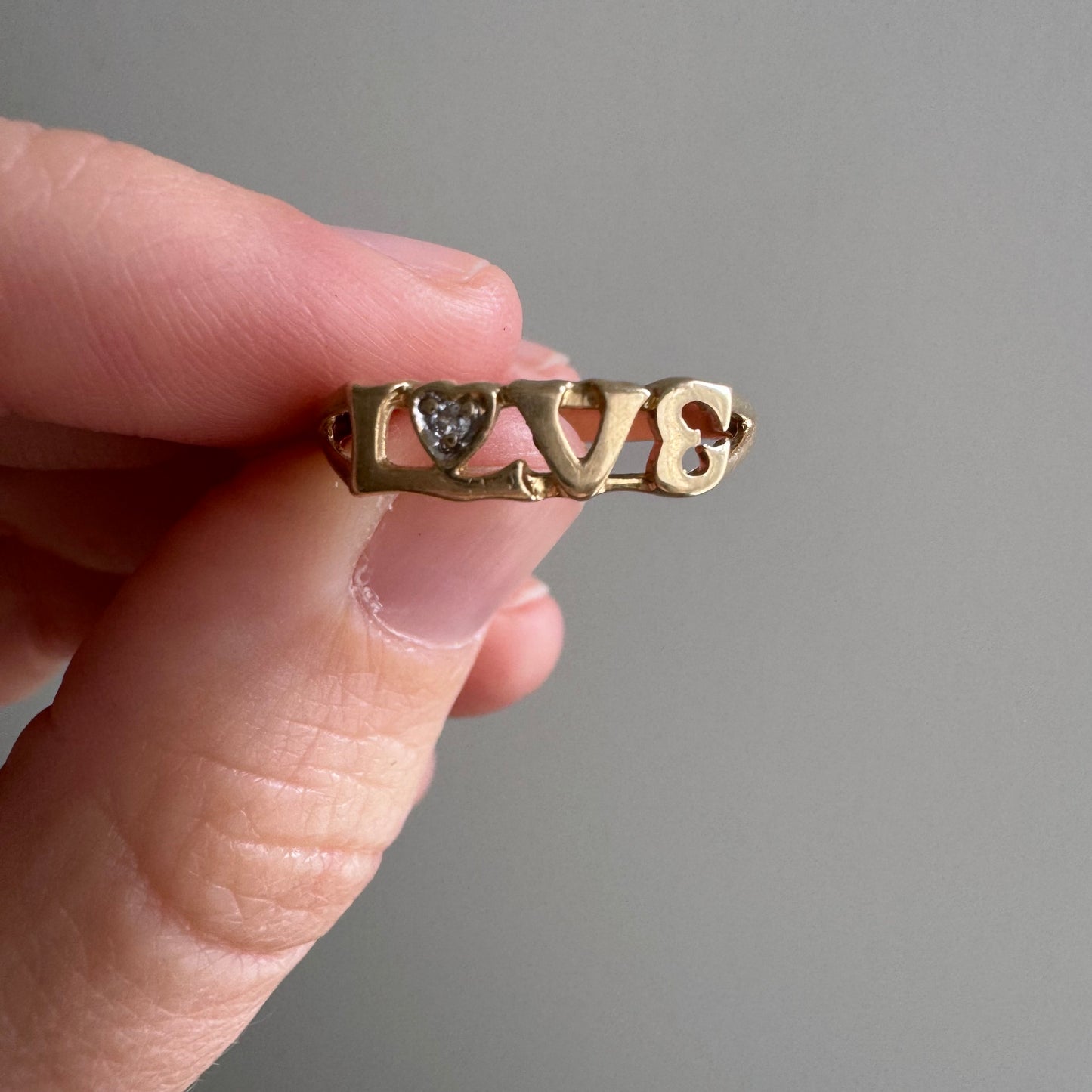 V I N T A G E // LOVE / 10k and diamond love word ring / size 6.75