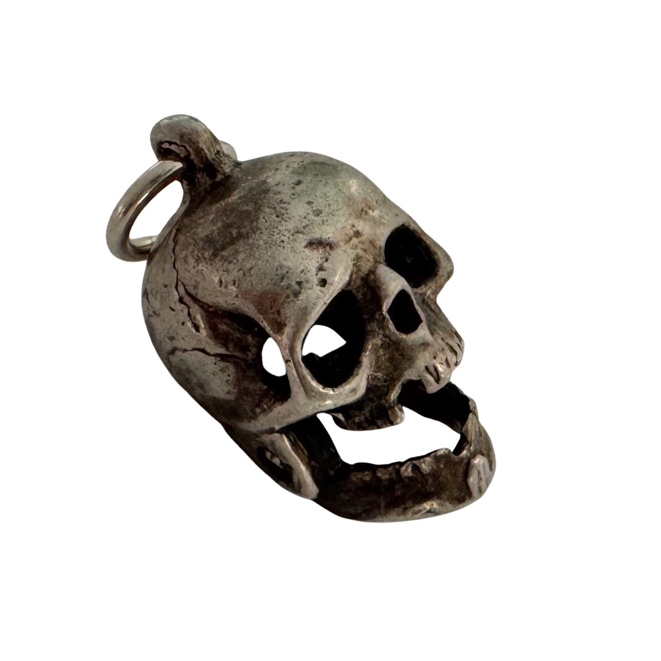 V I N T A G E // 1940s magic / sterling silver articulated skull charm