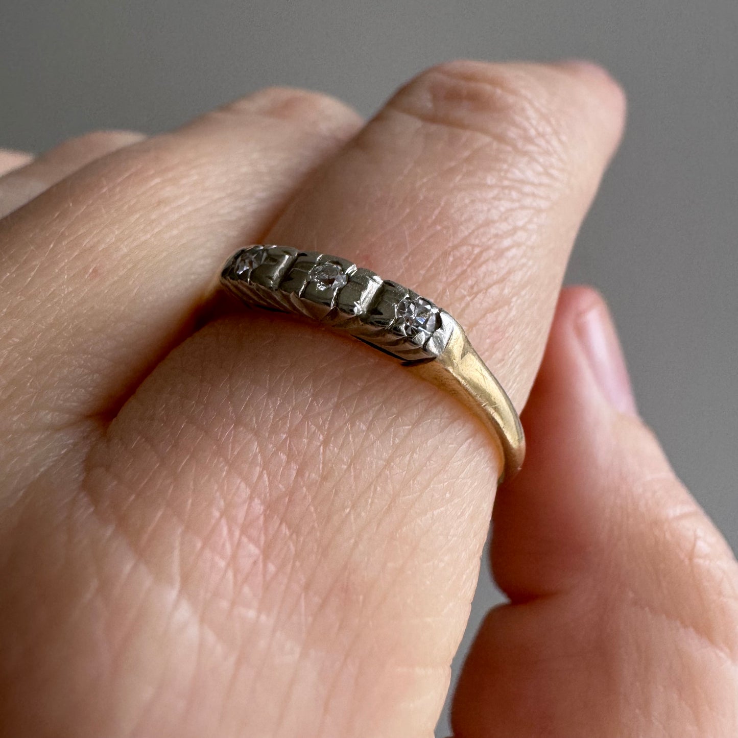 V I N T A G E // faintly floral / 14k yellow and white gold diamond trilogy band / size 8.5+