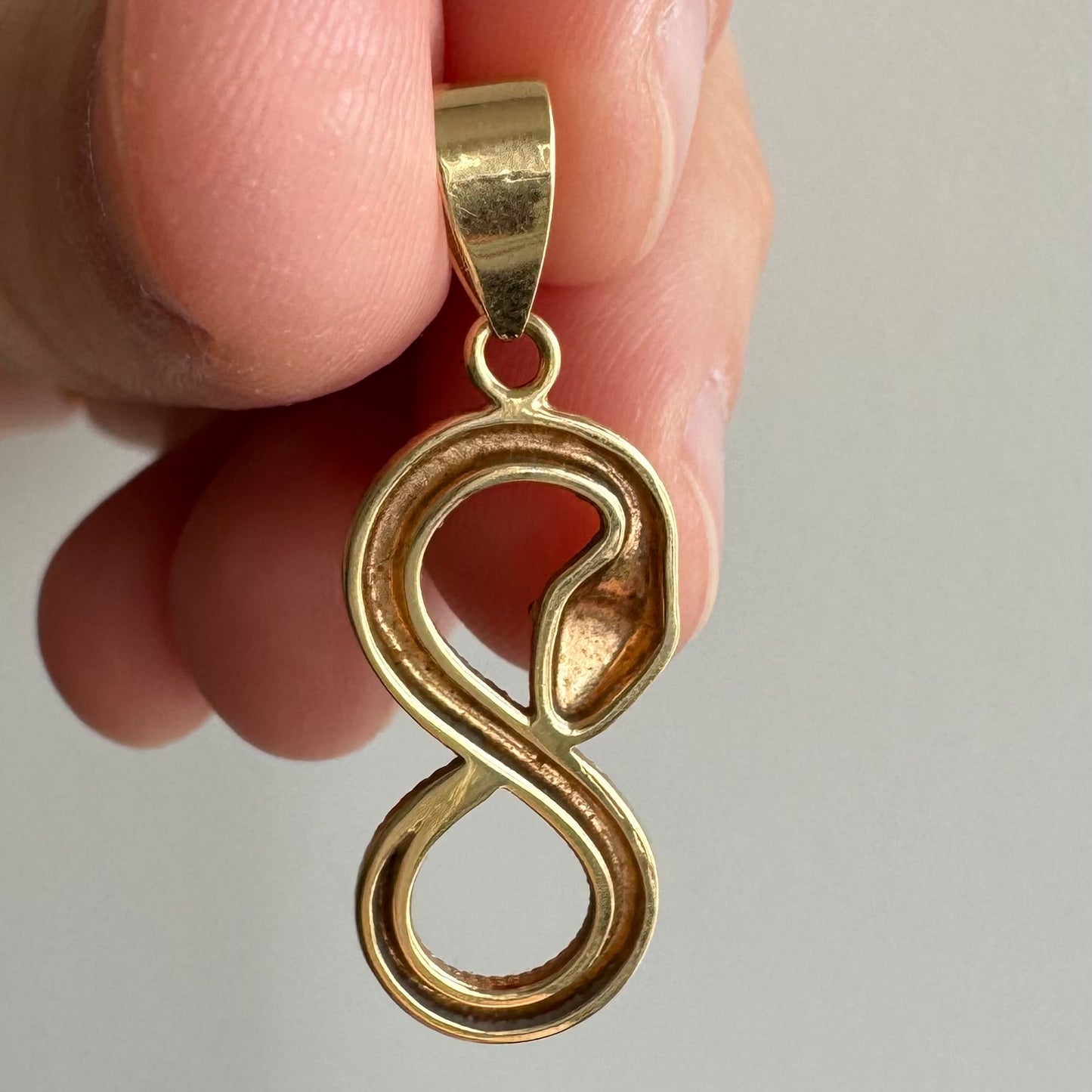 P R E - L O V E D // infinite ouroboros / 18k yellow gold serpent figure eight / a pendant