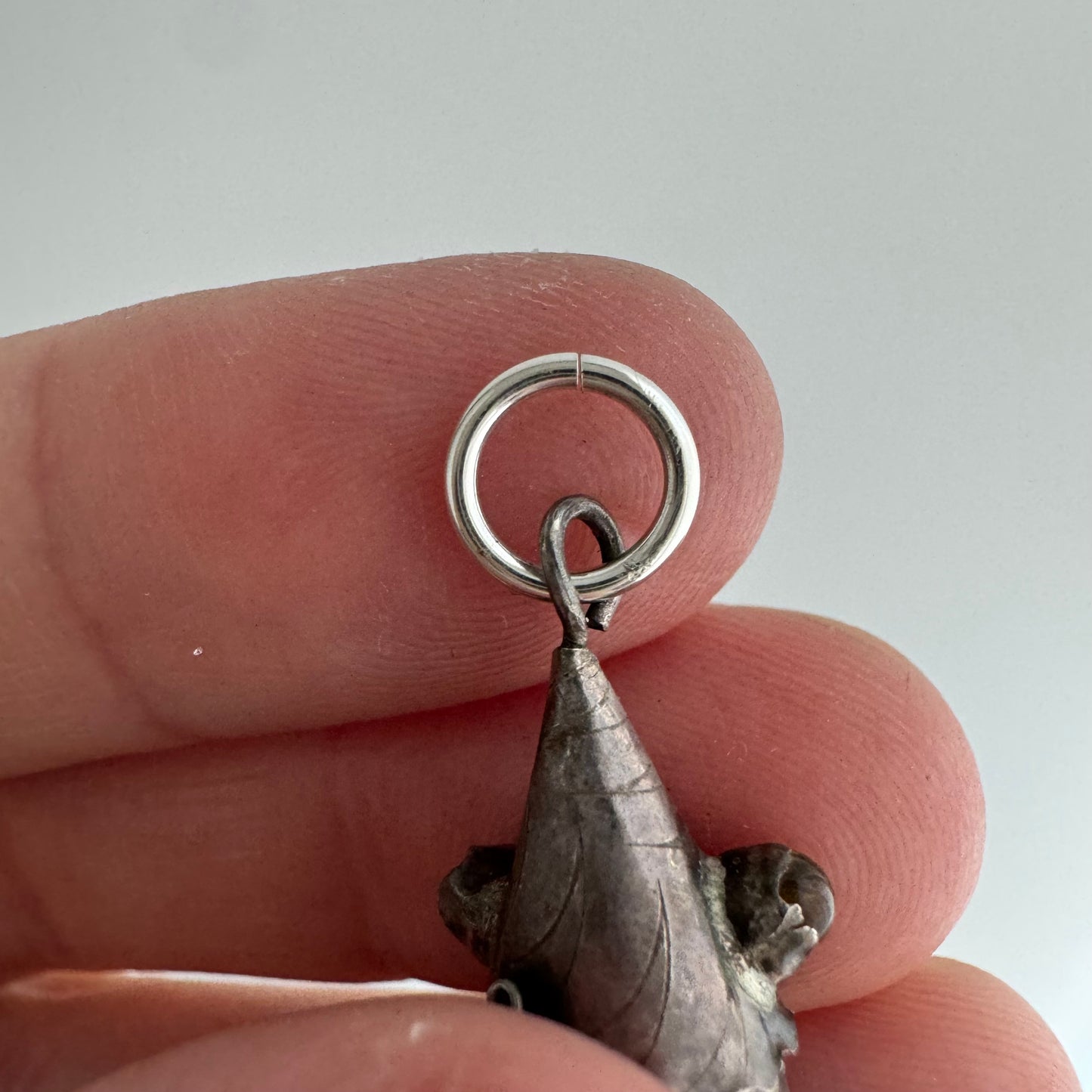 V I N T A G E // lucky catch / sterling silver articulated wiggle fish with orange eyes / a pendant