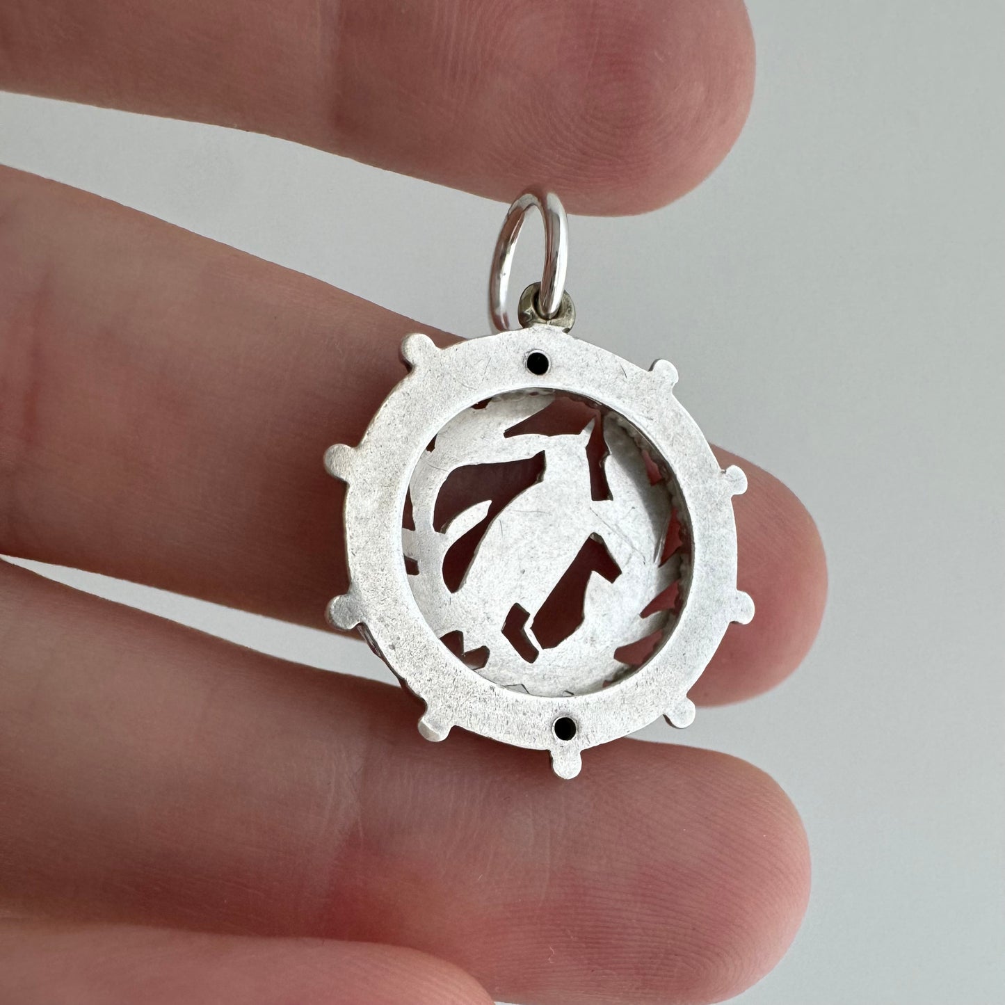 A N T I Q U E // the lookout / sterling silver bird and foliage in a detailed round frame / a pendant